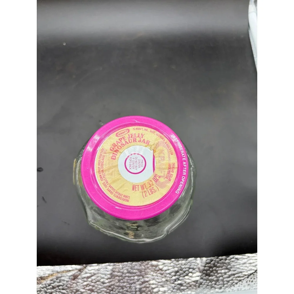Vintage‎ Kraft Grape Jelly Dinosaur Jar Triceratops 32oz Glass Pink Lid 1980s